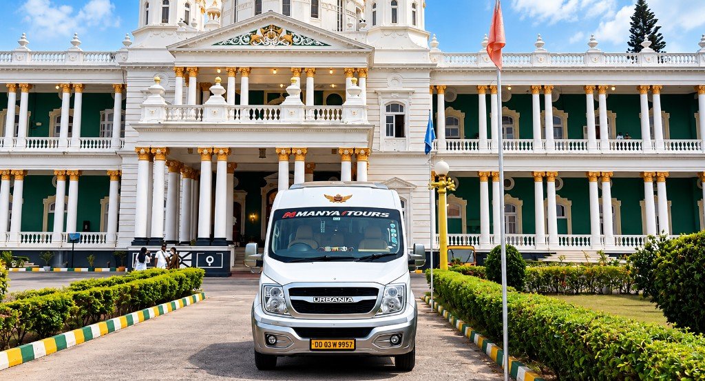 12 seater luxury Force Urbania from Manya Tours at a colonial building