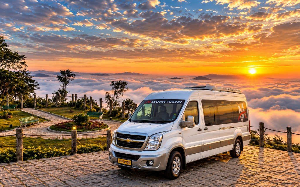 12 seater Manya Tours Urbania at a hill viewpoint at sunset