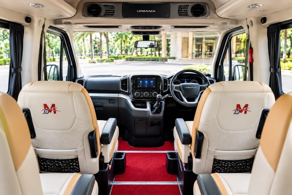 Driver cabin and front seats of the 13 seater Urbania