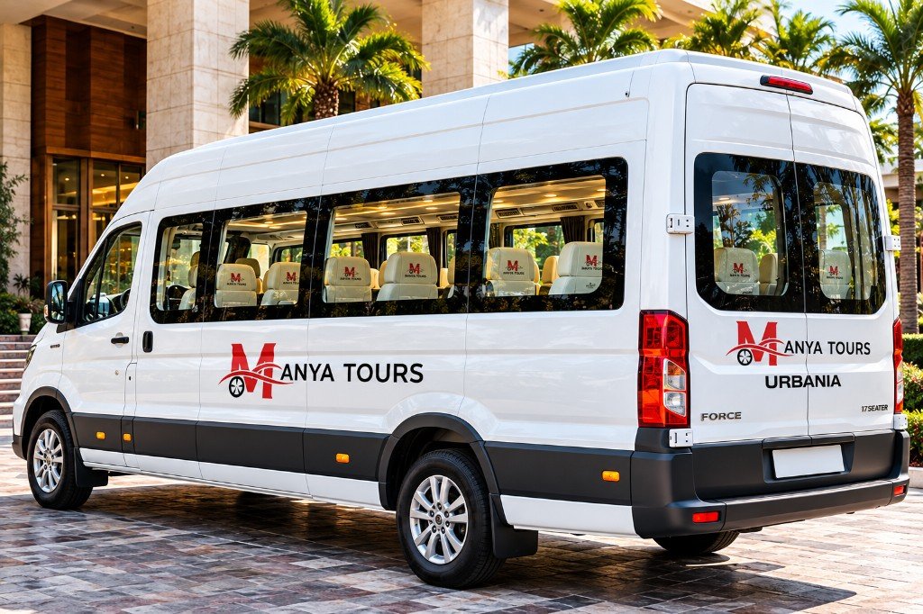 16 seater Manya Tours Urbania with fleet branding in Bangalore