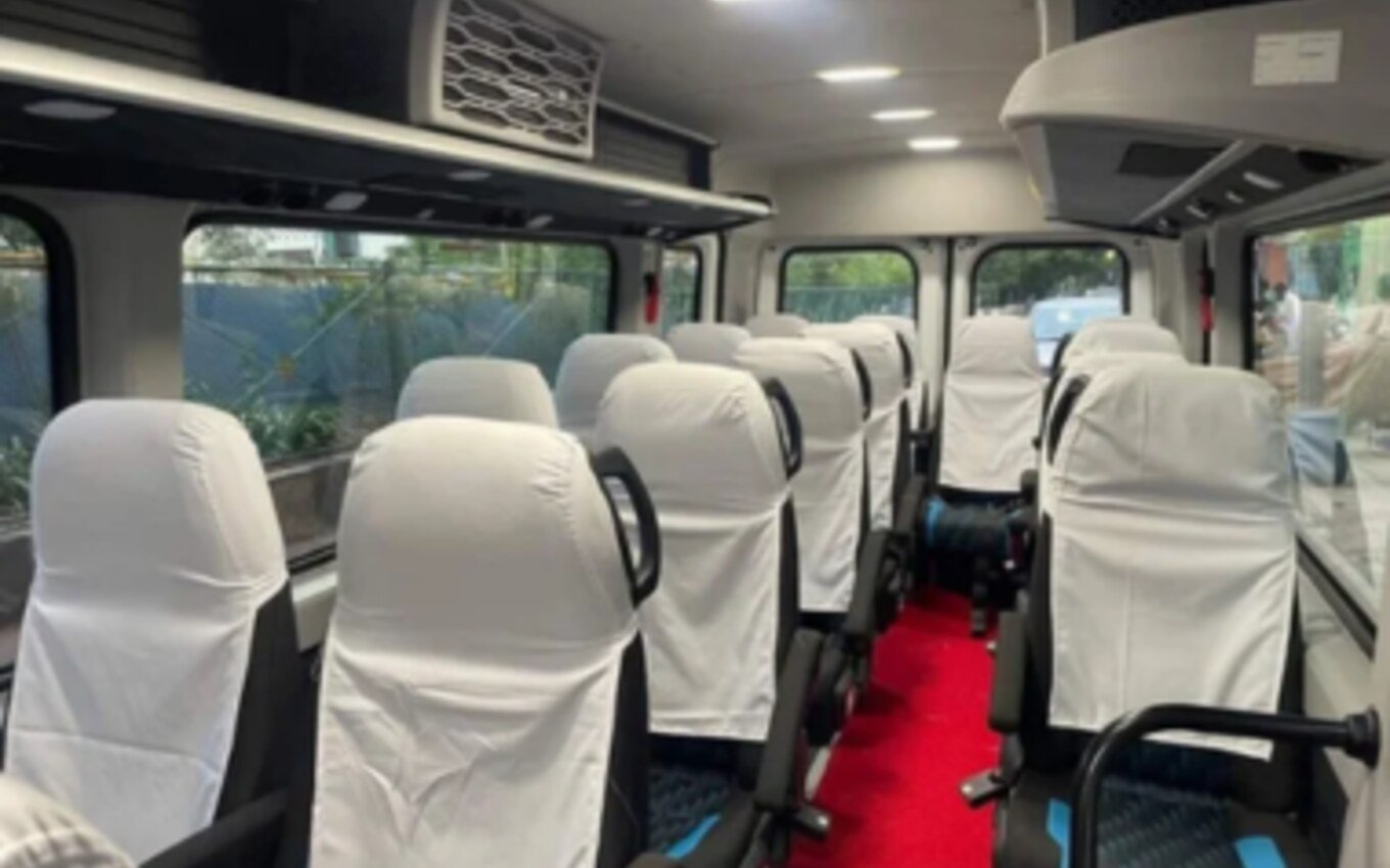 Passenger seats inside an Urbania used for outstation group travel
